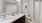 a bathroom with a sink toilet and mirror