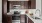 a kitchen with wooden cabinets