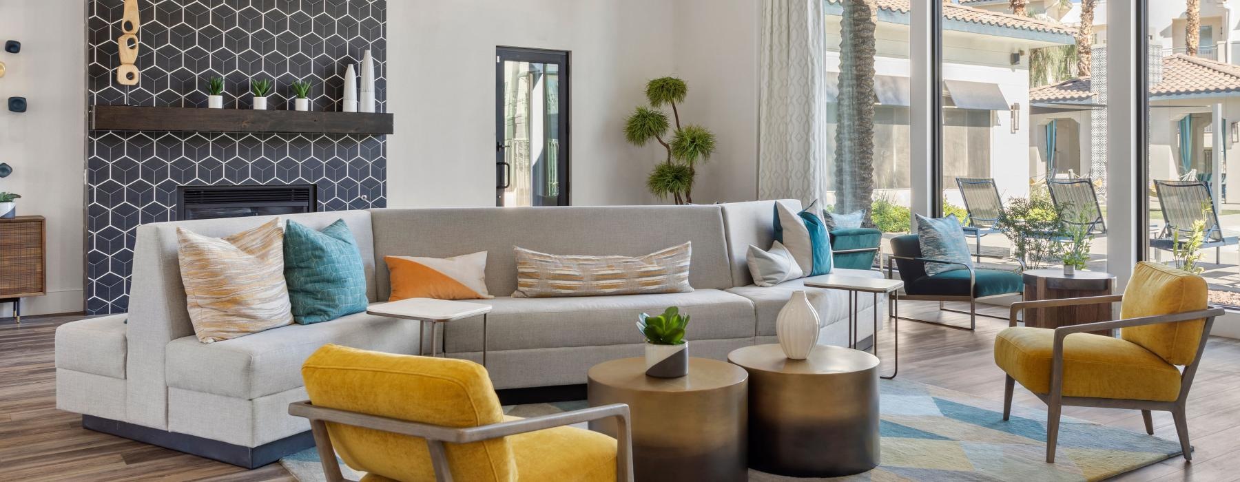 a living room with a couch and chairs
